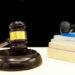 A law book with a gavel - Domestic violence law